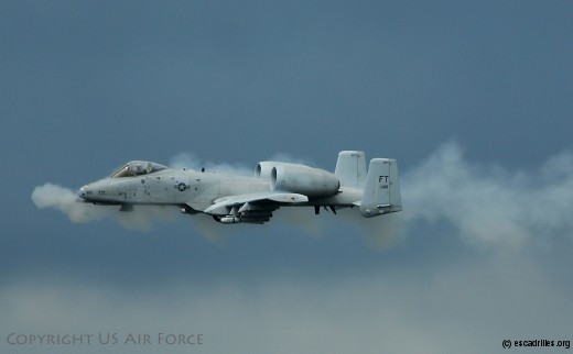 MOODY AIR FORCE BASE, Ga.  An A-10C Thunderbolt II ground attack aircraft performs a low-level strafing run with its 30 mm cannon during a combat search and rescue demonstration here Oct 4. The digitally-upgraded A-10C has been equipped with satellite-guided precision weaponry and advanced communications data links for transferring information with ground-based warfighters. (U.S. Air Force Photo by Tech. Sgt. Parker Gyokeres)