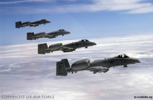 Four A-10s from the 111th Fighter Wing (FW), Willow Grove Air Reserve Station, PA fly in formation after taking on fuel from a KC-10A Extender from the 514th Air Mobility Wing, McGuire Air Force Base, NJ. The A-10s were on a training mission that included the air refueling. This image was taken on May 25, 2005. USAF photo by Kenn Mann.